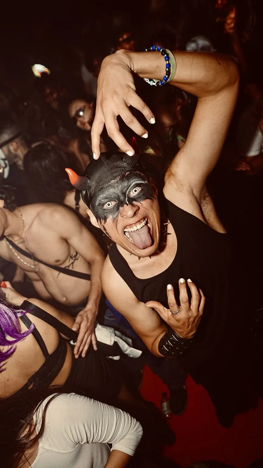 Costumed guests dancing close to the camera at Halloween 2025